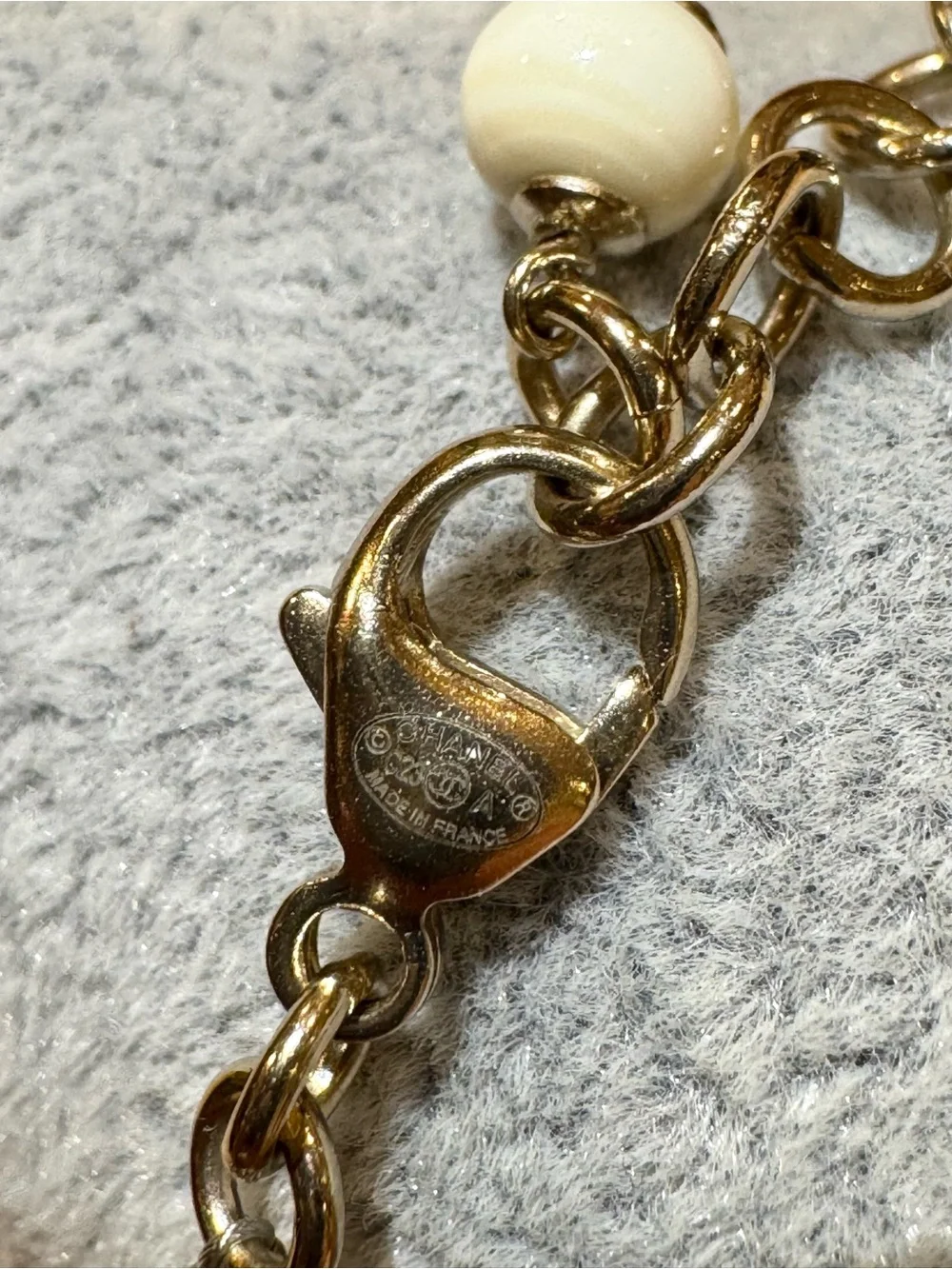 Chanel 2023 Gold/White Crystal & Resin Beads Coco CC Station Bracelet